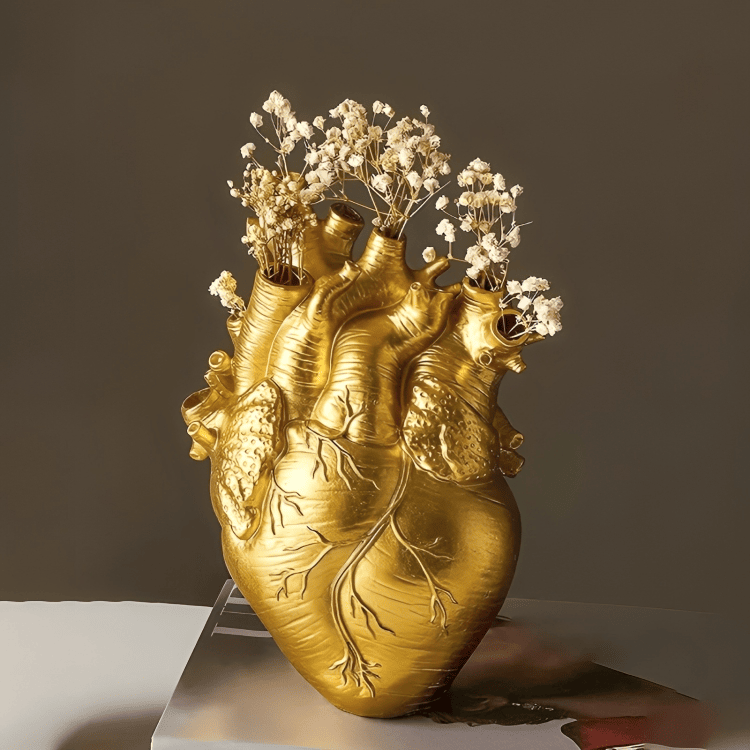 Front view of the PLTNRTZ® Amor Heart Vase in luxurious gold, perfect for modern home decor or as a statement piece.