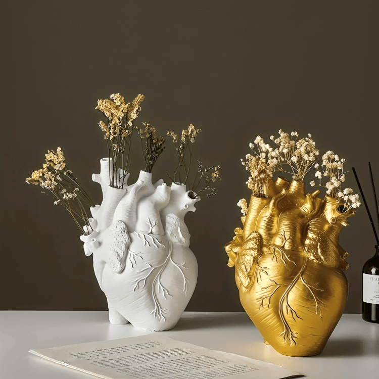 Gold and white PLTNRTZ® Amor Heart Vases side by side, displaying elegant color options for versatile home styling.